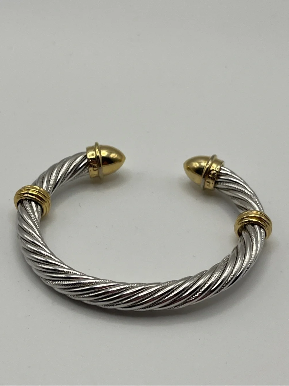 Silver-Tone Twisted Cable Cuff Bracelet with Gold Tone Accents